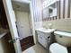 The bathroom features a vintage sink and toilet at 2253 Norwegian Dr # 63, Clearwater, FL 33763