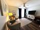 Charming living area featuring a ceiling fan, neutral paint and dark accents for a modern look at 2253 Norwegian Dr # 63, Clearwater, FL 33763