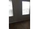 Bedroom with carpet and two windows at 244 Countryside Key Blvd, Oldsmar, FL 34677