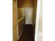 Hallway featuring neutral walls, carpet, and access to multiple rooms, with laundry on second floor at 244 Countryside Key Blvd, Oldsmar, FL 34677