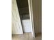 A laundry room featuring a white washer and dryer inside of a small closet with white doors at 244 Countryside Key Blvd, Oldsmar, FL 34677