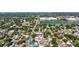 An aerial view of the neighborhood featuring the home with a nice yard and ample parking on a tree lined street at 2635 13Th N Ave, St Petersburg, FL 33713