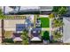 Aerial view showcases lush landscaping, yard, gazebo, and covered parking at 2635 13Th N Ave, St Petersburg, FL 33713