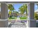 Inviting backyard featuring a gazebo, paved walkway, lush lawn, and stylish landscaping at 2635 13Th N Ave, St Petersburg, FL 33713