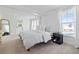 Bright and airy bedroom with neutral decor, large windows, and modern furnishings at 2635 13Th N Ave, St Petersburg, FL 33713