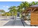 Beautiful home exterior with a well-maintained yard, and lush tropical landscaping at 2635 13Th N Ave, St Petersburg, FL 33713