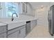 This gorgeous kitchen offers ample cabinet space, modern appliances, and lots of natural light at 2635 13Th N Ave, St Petersburg, FL 33713