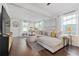 Bright living room with hardwood floors, large sectional sofa, and abundant natural light at 2635 13Th N Ave, St Petersburg, FL 33713