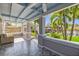 Relaxing outdoor space with stylish tile, seating, and view of a gazebo and landscaped yard at 2635 13Th N Ave, St Petersburg, FL 33713