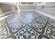 Eye-level shot of the outdoor tile pattern with unique designs perfect for a porch or patio space at 2635 13Th N Ave, St Petersburg, FL 33713