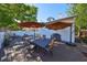 Inviting backyard deck with umbrellas, seating, and dining, perfect for outdoor entertaining and relaxation at 2802 Old Bayshore Way, Tampa, FL 33611