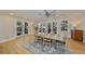 Bright dining area with multiple windows and french doors at 2802 Old Bayshore Way, Tampa, FL 33611