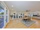Open dining area with multiple windows, connecting seamlessly to the living room and outdoor spaces at 2802 Old Bayshore Way, Tampa, FL 33611