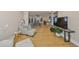 Bright living room with hardwood floors flows into the dining area, creating a spacious and open floor plan at 2802 Old Bayshore Way, Tampa, FL 33611