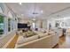 Bright living area with hardwood floors, an open layout, and multiple windows offering great natural light at 2802 Old Bayshore Way, Tampa, FL 33611
