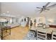 Open concept with dining area, stairs and living spaces at 2802 Old Bayshore Way, Tampa, FL 33611