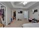 Spacious bedroom includes several closets and doorways, with a ceiling fan and neutral carpet and wall colors at 2915 Royal Tuscan Ln, Valrico, FL 33594