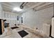 The garage is very spacious and has two black mats on the floor at 2915 Royal Tuscan Ln, Valrico, FL 33594