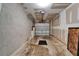 Spacious garage with white block walls and a new-looking garage door at 2915 Royal Tuscan Ln, Valrico, FL 33594