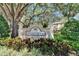 Welcoming 'Wedgewood' community sign amidst lush greenery and mature trees at 2915 Royal Tuscan Ln, Valrico, FL 33594
