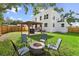 Extensive backyard with outdoor space for entertaining and relaxation by the fire pit at 3000 19Th S Ave, St Petersburg, FL 33712