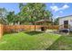 Spacious backyard featuring a gazebo, fire pit, and well-maintained lawn at 3000 19Th S Ave, St Petersburg, FL 33712