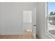 Bright room featuring access to a closet, light wood floors, and a bright window at 3000 19Th S Ave, St Petersburg, FL 33712