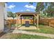 Charming backyard gazebo for outdoor entertaining, situated on a lush lawn at 3000 19Th S Ave, St Petersburg, FL 33712