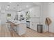 Modern kitchen featuring stainless steel appliances, a large center island, and ample cabinet space at 3000 19Th S Ave, St Petersburg, FL 33712
