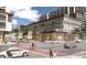A vibrant Westshore Plaza scene with retail and office space, palm trees and pedestrian activity, creating an inviting atmosphere at 312 N Manhattan Ave, Tampa, FL 33609