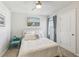 Cozy bedroom featuring ceiling fan and a light color palette at 3158 Victoria Inlet Dr, Holiday, FL 34691
