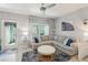 Cozy living room with comfortable seating, neutral colors, and natural light creating a relaxing atmosphere at 3158 Victoria Inlet Dr, Holiday, FL 34691