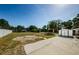 Large, expansive backyard with a storage shed, ideal for outdoor activities at 3216 W Paxton Ave, Tampa, FL 33611