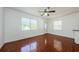Inviting living room featuring bright light, tile flooring, and front entrance at 3216 W Paxton Ave, Tampa, FL 33611