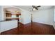 Open-concept living room and kitchen area with stylish tiled floors and abundant natural light at 3216 W Paxton Ave, Tampa, FL 33611