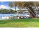 The private dock features boatlifts and jet skis, offering endless water activities at 3407 W Busch Blvd, Tampa, FL 33618