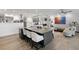 Open-concept kitchen with a large island, modern appliances, and seamless integration with the living space at 3407 W Busch Blvd, Tampa, FL 33618