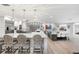 Modern kitchen with a marble island, stainless steel appliances, and an open design at 3407 W Busch Blvd, Tampa, FL 33618