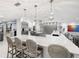 Spacious kitchen features a large marble island with seating and stainless steel appliances at 3407 W Busch Blvd, Tampa, FL 33618