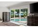 Main bedroom view of backyard pool and beautiful lake at 3407 W Busch Blvd, Tampa, FL 33618