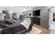 Open-concept main bedroom with sliding glass doors to backyard pool and entertainment area at 3407 W Busch Blvd, Tampa, FL 33618