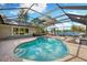 Spacious screened-in pool with a view to the lake at 3407 W Busch Blvd, Tampa, FL 33618