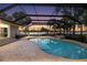 Screened in pool with a view of the water at 3407 W Busch Blvd, Tampa, FL 33618