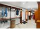 Extensive walk-in closet with ample wooden storage, shelves, drawers, and walk-out door at 3407 W Busch Blvd, Tampa, FL 33618