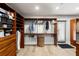 Spacious walk-in closet with wooden storage organizers, shelves, and drawers at 3407 W Busch Blvd, Tampa, FL 33618