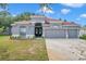 A large backyard provides green space and privacy, with a vinyl fence and mature trees at 3527 101St E Ave, Parrish, FL 34219