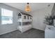The bedroom offers a built-in bunk bed in the shape of a house and unique light fixture at 3527 101St E Ave, Parrish, FL 34219