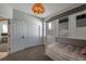This bedroom offers a built-in bunk bed in the shape of a house and a nearby closet at 3527 101St E Ave, Parrish, FL 34219