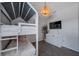 The bedroom offers a built-in bunk bed in the shape of a house and a wall-mounted TV at 3527 101St E Ave, Parrish, FL 34219
