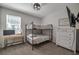 Bedroom featuring a bunk bed, desk, dresser and TV at 3527 101St E Ave, Parrish, FL 34219